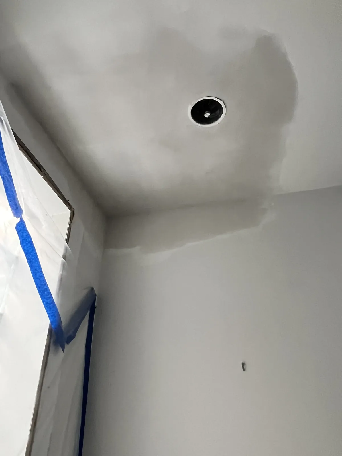 Ceiling drywall repair wide finishing view